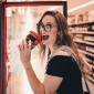 woman eating huzelnut icecream